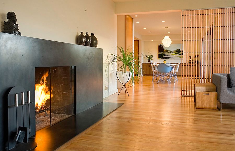 Дизайнерские цветочные горшки в стильном интерьере гостиной от BAAN design