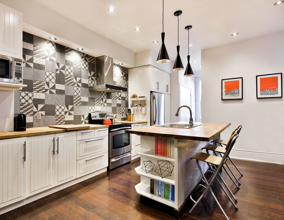 Черно-белая фарфоровая плитка в интерьере кухни в промышленном стиле